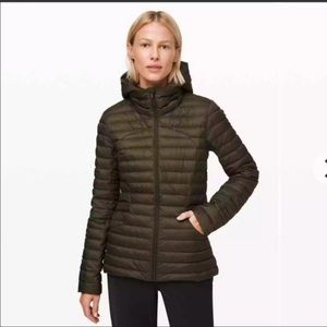 In excellent new condition Lululemon size 4 pack it down jacket in dark olive